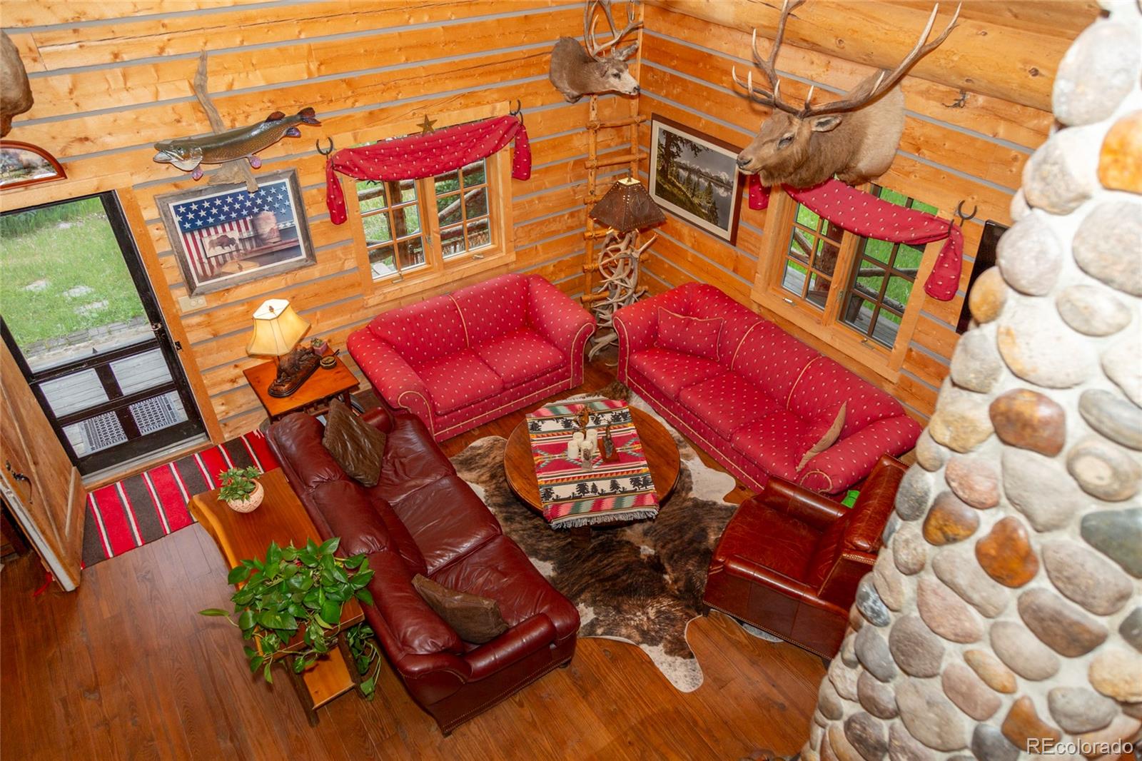 2150 Usfs Road, Unit 18A Creede, CO 81130 - Photo 4 of 25 a view of a chairs and table in the balcony
