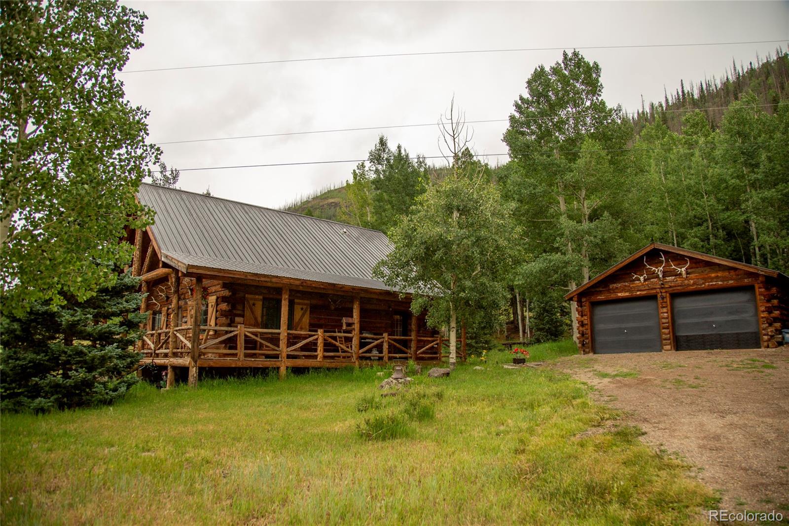 2150 Usfs Road, Unit 18A Creede, CO 81130 - Photo 8 of 25 a view of a house with garden yard and deck