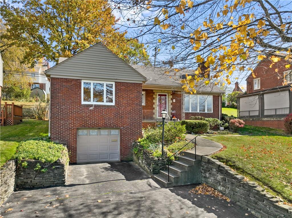 227 Old Clairton Road Pittsburgh, PA 15236 - Photo 1 of 22 a front view of a house with a yard