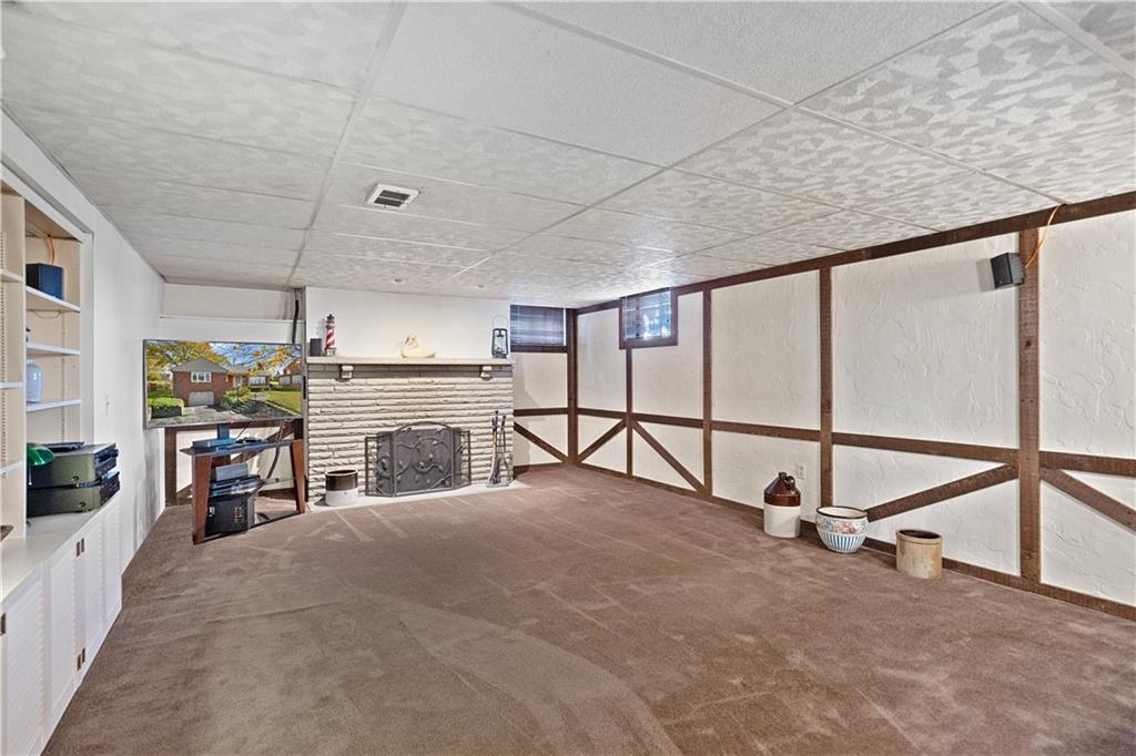 227 Old Clairton Road Pittsburgh, PA 15236 - Photo 13 of 22 a view of a livingroom with a fireplace