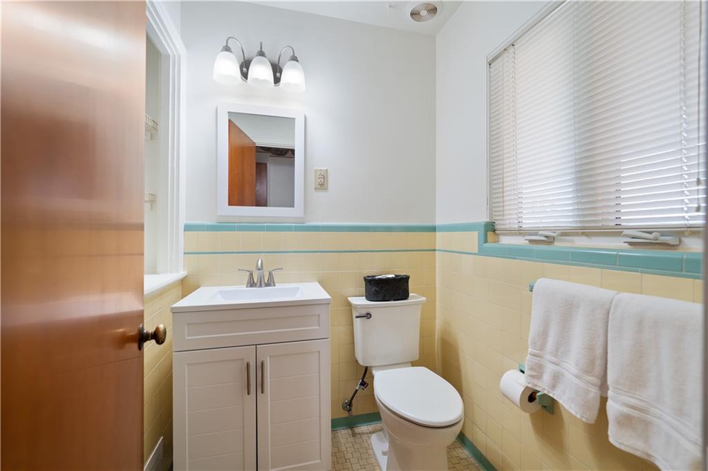 227 Old Clairton Road Pittsburgh, PA 15236 - Photo 15 of 22 a bathroom with a sink mirror toilet and bathtub