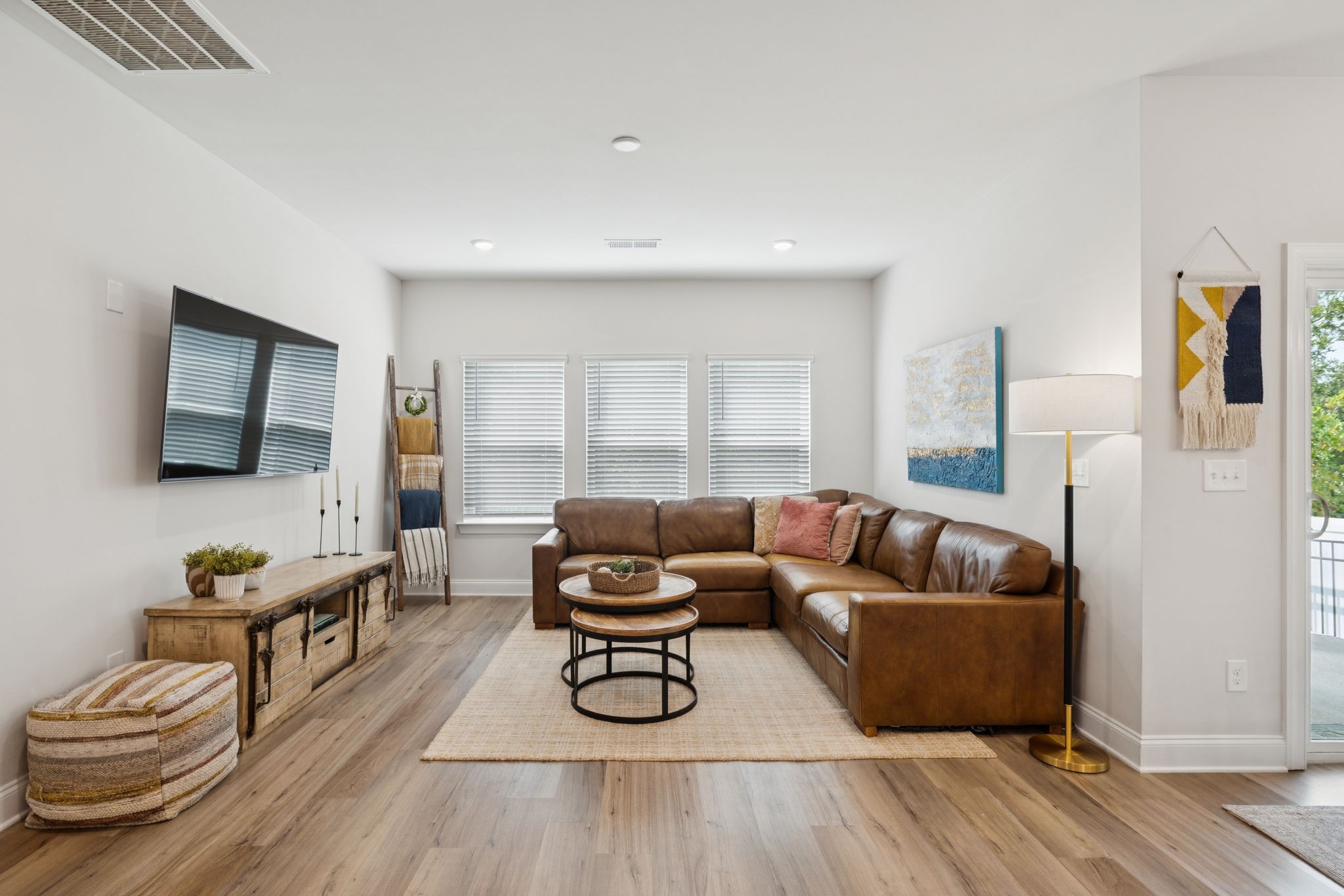 3316 Longstalk Road Antioch, TN 37013 - Photo 16 of 40 a living room with furniture and a flat screen tv