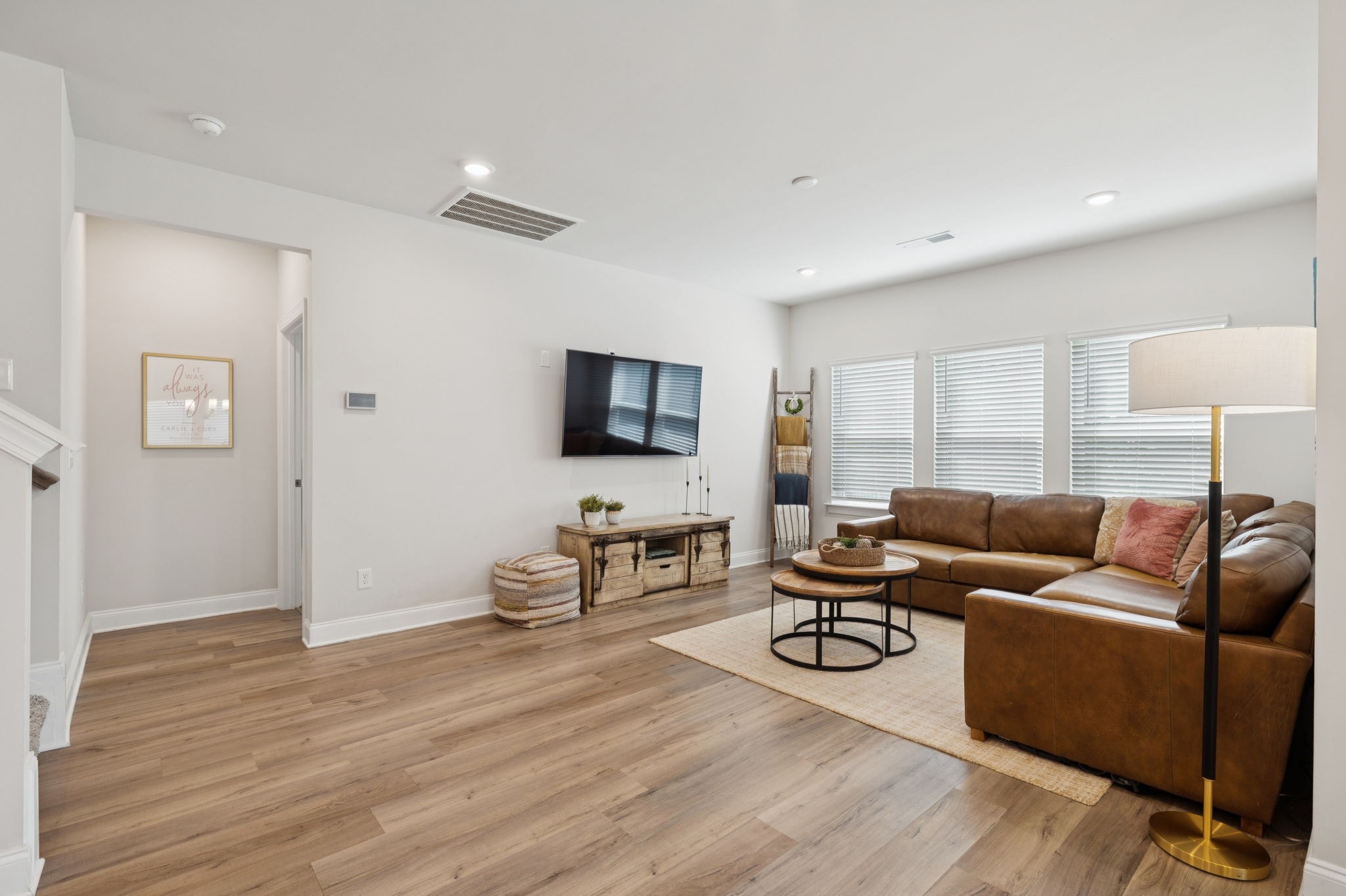 3316 Longstalk Road Antioch, TN 37013 - Photo 19 of 40 a living room with furniture flat screen tv and wooden floor