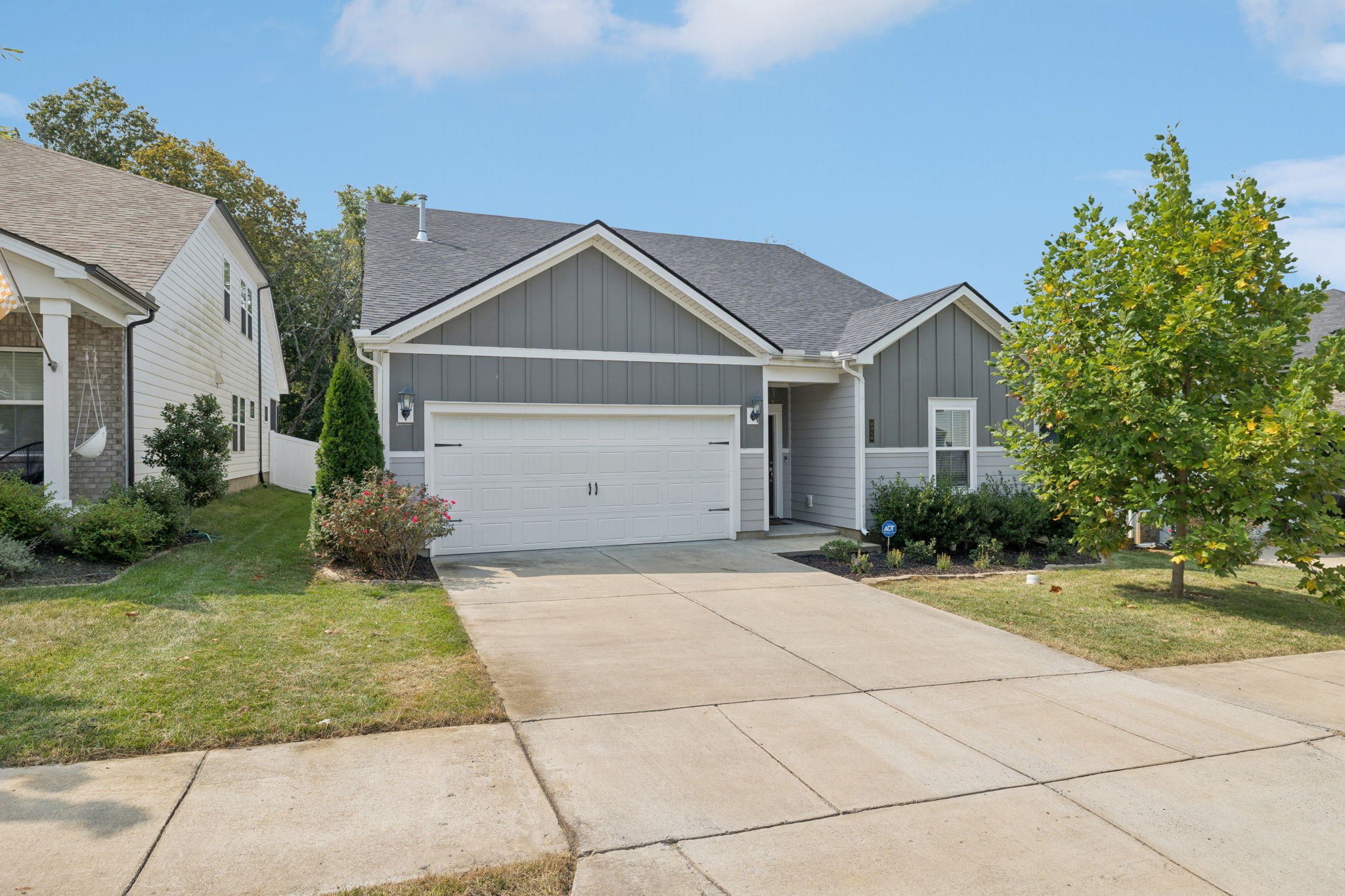 3316 Longstalk Road Antioch, TN 37013 - Photo 2 of 40 a front view of a house with a yard