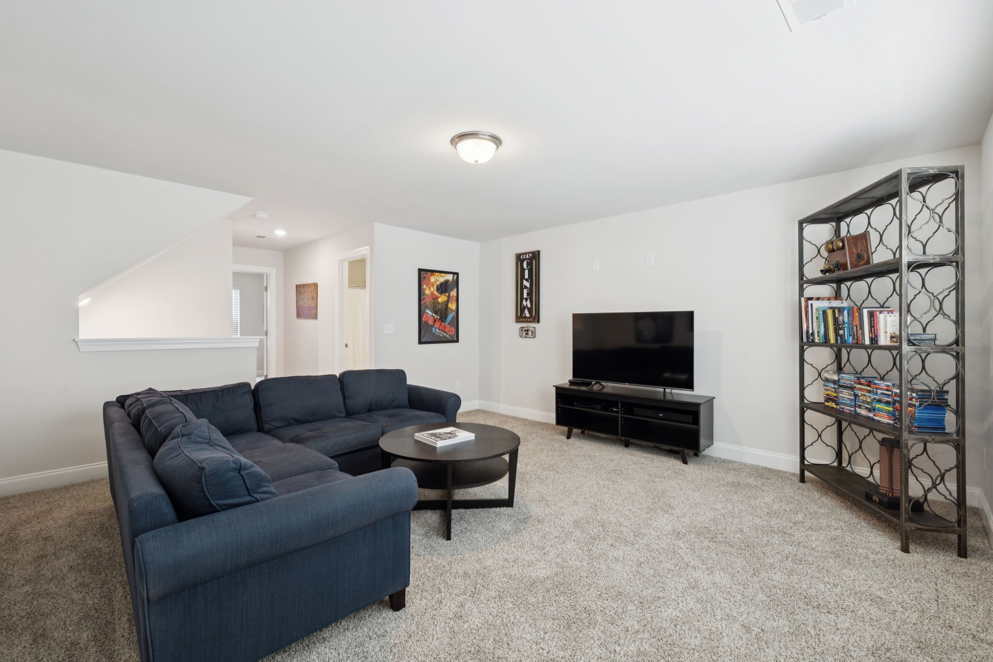3316 Longstalk Road Antioch, TN 37013 - Photo 27 of 40 a living room with furniture and a flat screen tv