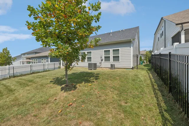 a front view of house with yard