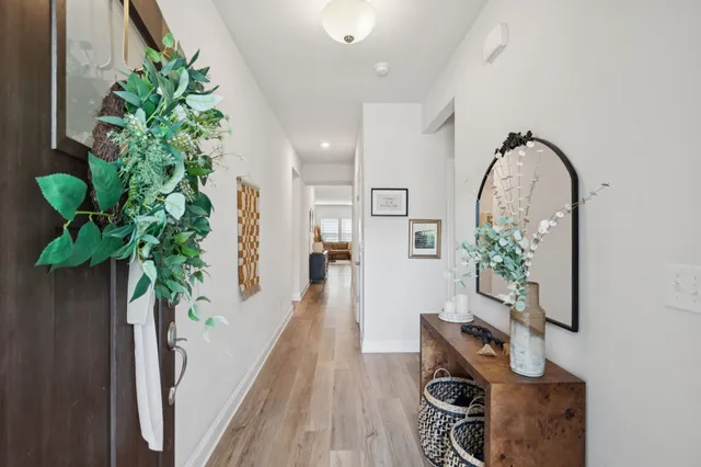 a view of a entryway with wooden floor