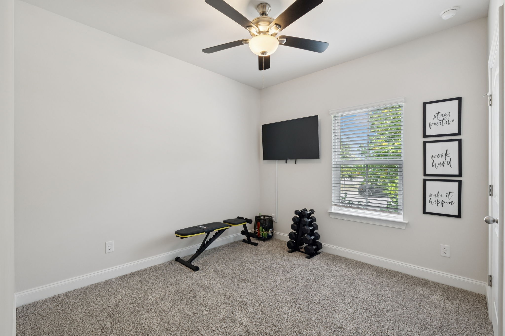 3316 Longstalk Road Antioch, TN 37013 - Photo 7 of 40 a view of a livingroom with a window and a ceiling fan