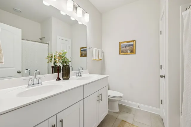 a bathroom with a shower and a bath tub