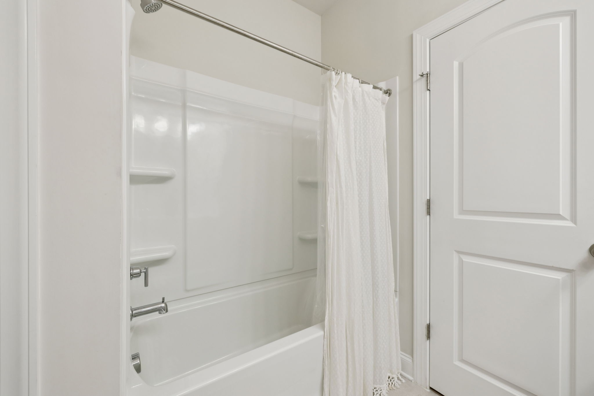 3316 Longstalk Road Antioch, TN 37013 - Photo 9 of 40 a bathroom with a shower and a bath tub