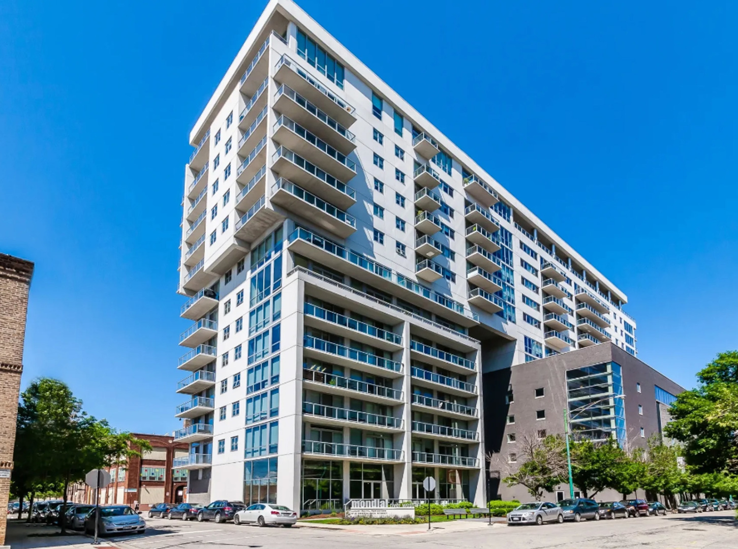 910 West Huron Street, Unit 1310 Chicago, IL 60642 - Photo 1 of 25 a front view of a building