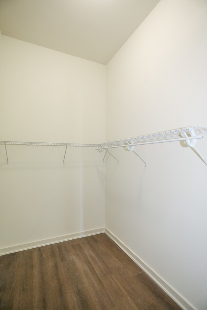 910 West Huron Street, Unit 1310 Chicago, IL 60642 - Photo 12 of 25 a view of a room with racks on the wall