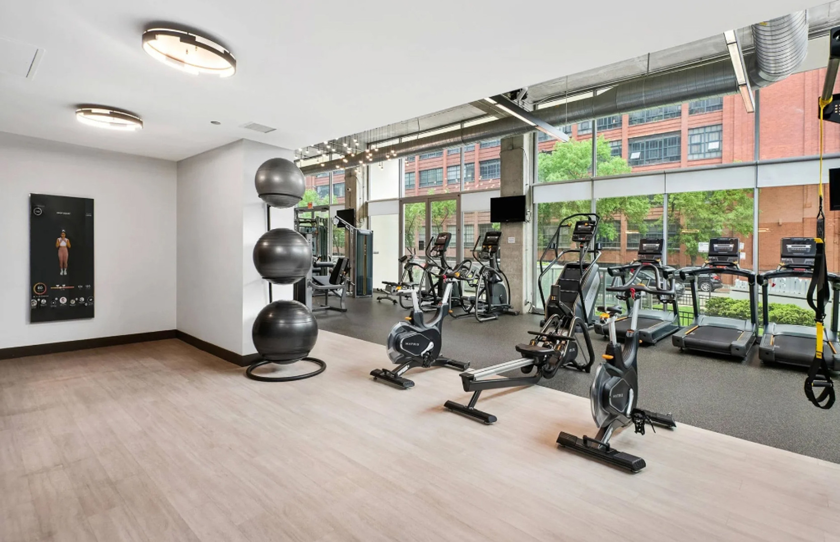 910 West Huron Street, Unit 1310 Chicago, IL 60642 - Photo 24 of 25 a view of a room with gym equipment