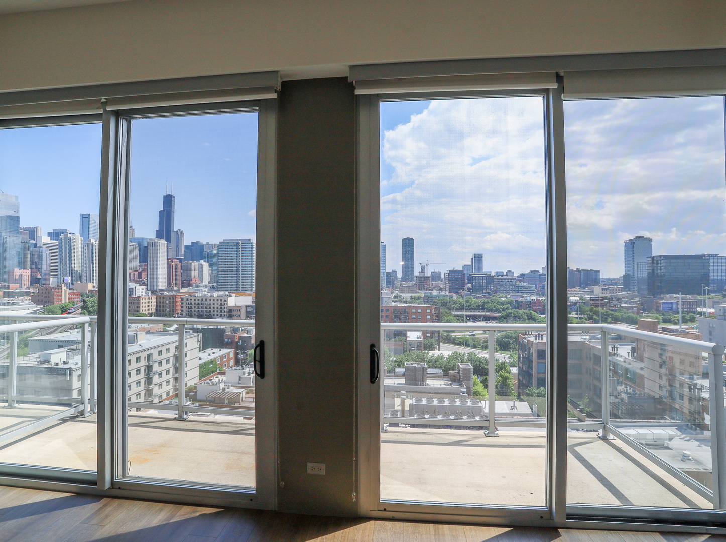910 West Huron Street, Unit 1310 Chicago, IL 60642 - Photo 6 of 25 a view of a city from a window