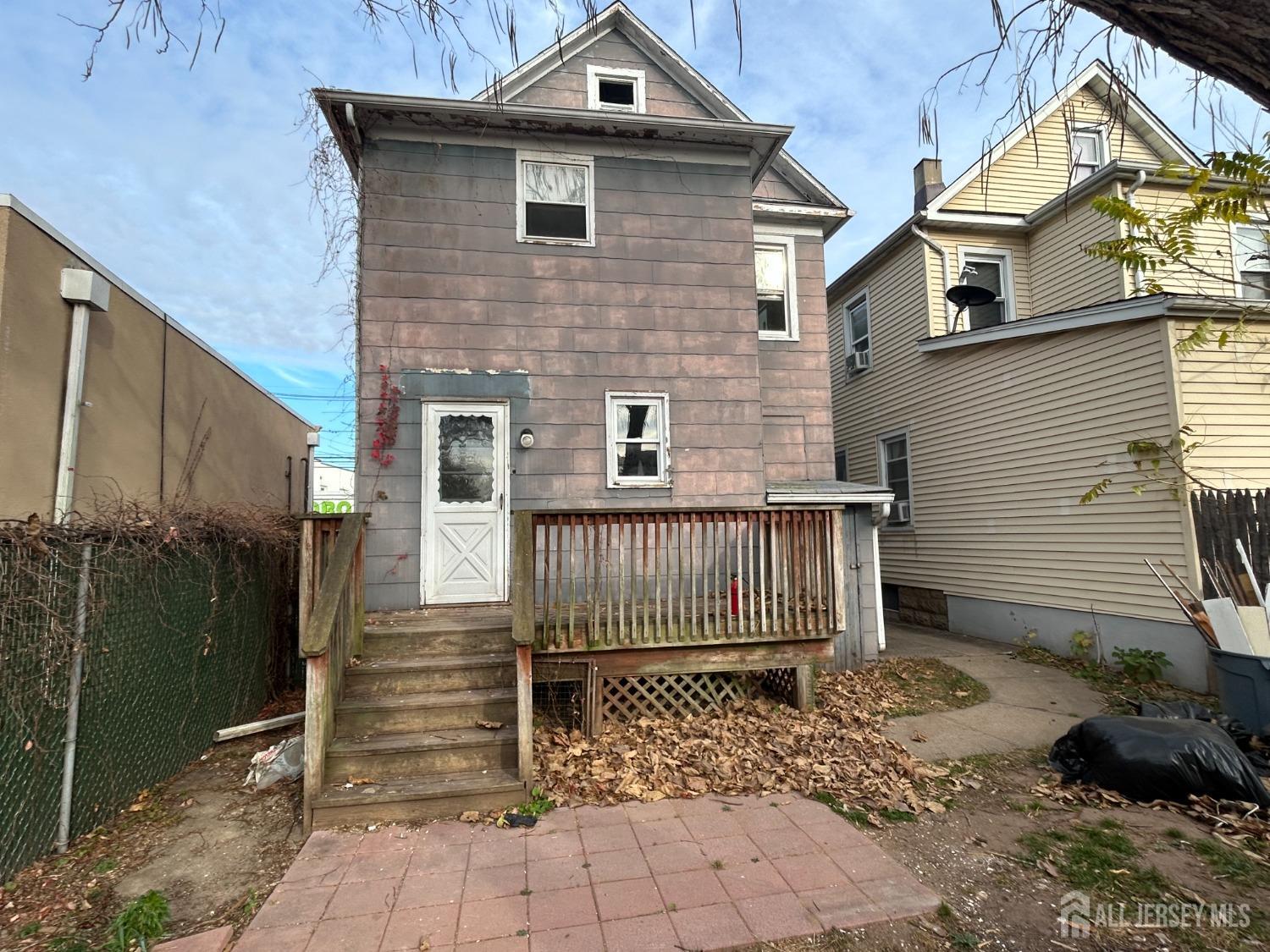580 Bound Brook Road Middlesex, NJ 08846 - Photo 8 of 26 a front view of a house with garden