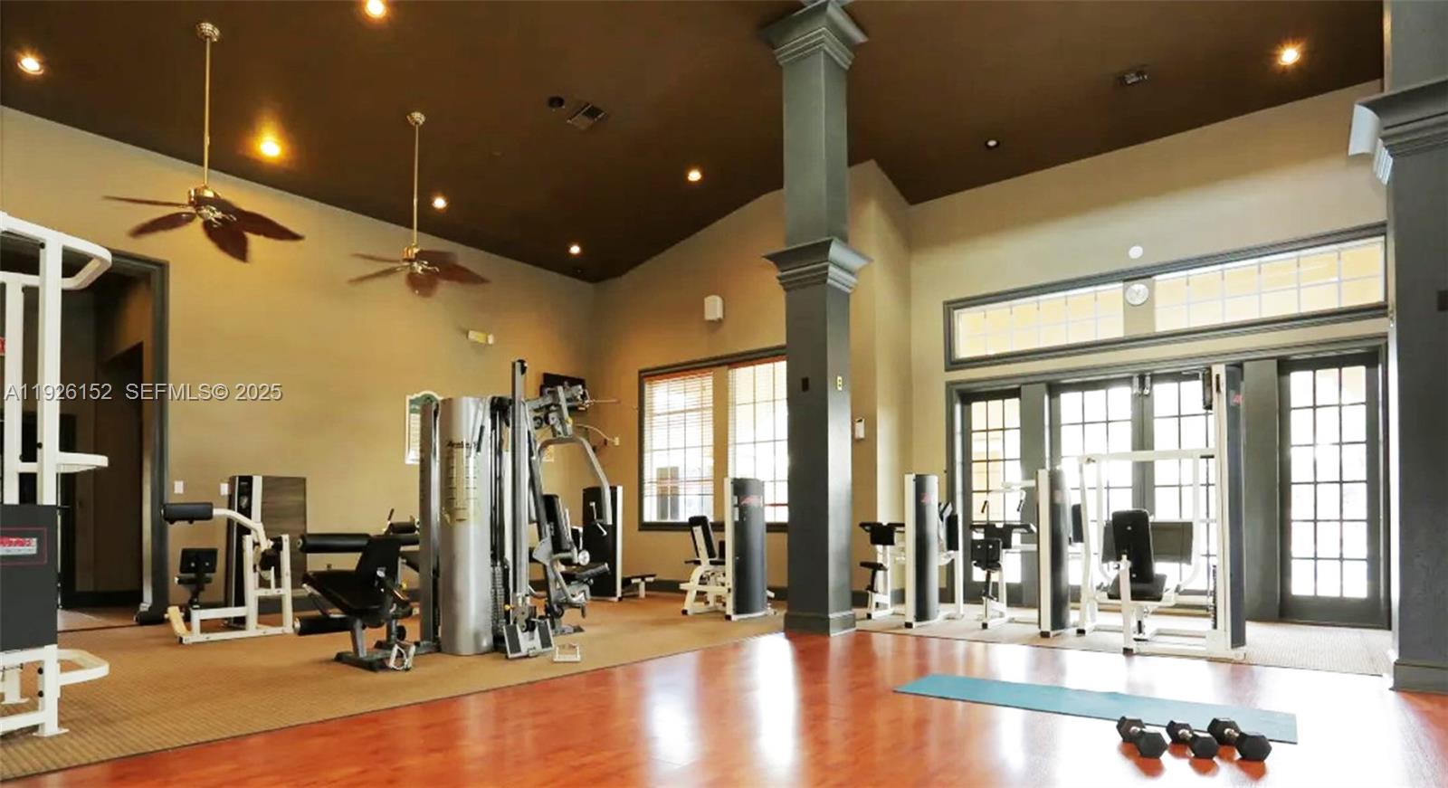 2451 Centergate Drive, Unit 104 Miramar, FL 33025 - Photo 6 of 6 a view of a room with gym equipment