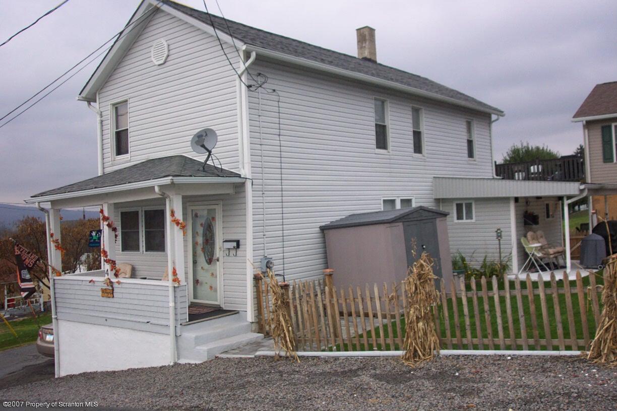 4 Winter Street Inkerman, PA 18640 - Photo 1 of 1 a view of a house with a small yard and plants