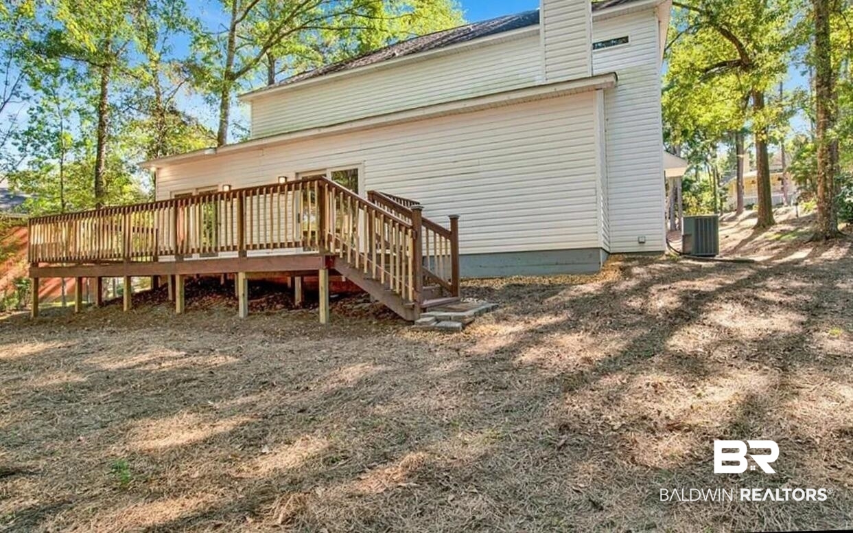 632 Ridgewood Drive Daphne, AL 36526 - Photo 34 of 36 Back of property with a wooden deck and central air condition unit