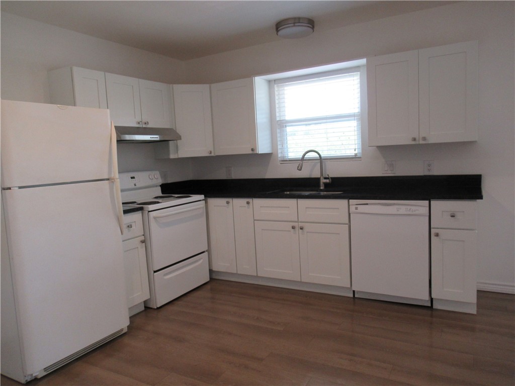 10620 D Deer Canyon Road, Unit D Jonestown, TX 78645 - Photo 2 of 22 Granite counter tops & dishwasher & Frigerator