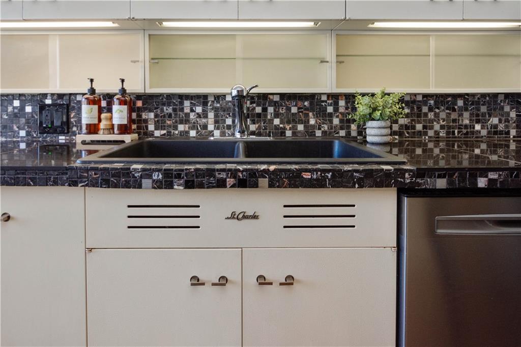 3113 Hillcrest Road Bethel Park, PA 15102 - Photo 15 of 50 a kitchen with a stove and a refrigerator