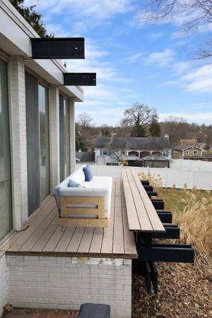 3113 Hillcrest Road Bethel Park, PA 15102 - Photo 38 of 50 a view of a roof deck with couches and wooden floor