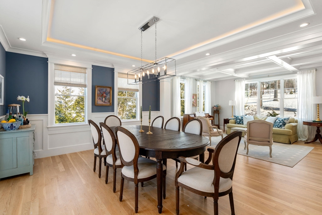 33 Maugus Hill Road Wellesley, MA 02481 - Photo 12 of 34 a dining room with furniture a chandelier and wooden floor