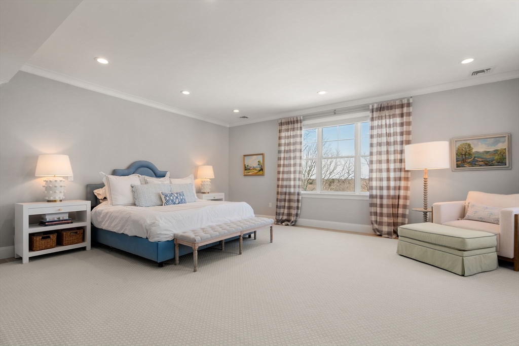 33 Maugus Hill Road Wellesley, MA 02481 - Photo 16 of 34 a spacious bedroom with a bed and a couch