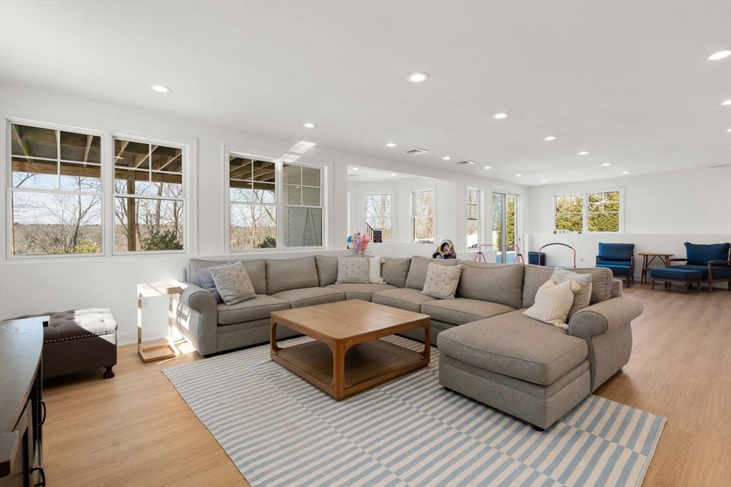 33 Maugus Hill Road Wellesley, MA 02481 - Photo 26 of 34 a living room with furniture and a window