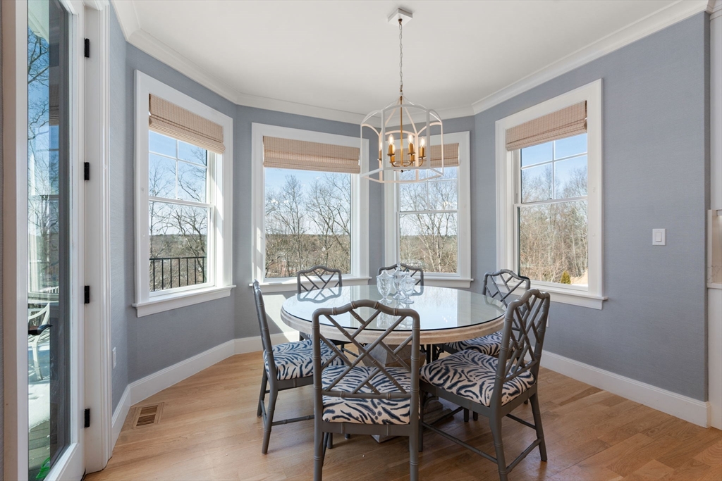 33 Maugus Hill Road Wellesley, MA 02481 - Photo 9 of 34 a view of a dining room with furniture window and outside view