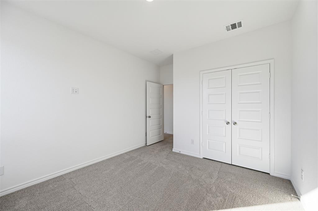 400 Wrangler Lane, Unit 400 Denton, TX 76209 - Photo 15 of 18 a view of an empty room
