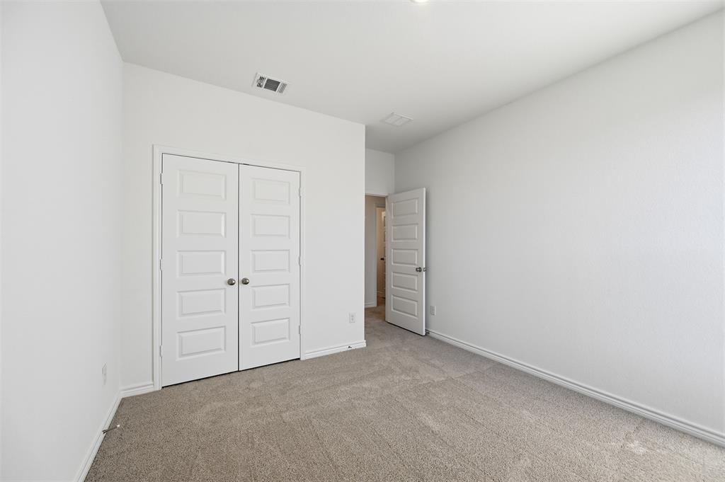 400 Wrangler Lane, Unit 400 Denton, TX 76209 - Photo 16 of 18 a view of an empty room