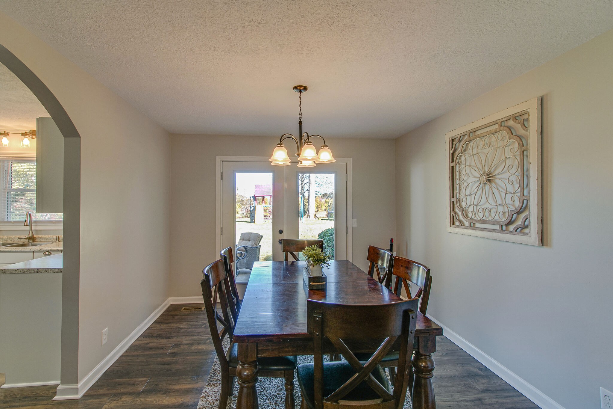 605 Lakeview Court Tennessee Ridge, TN 37178 - Photo 14 of 30 a view of a dining room with furniture window and wooden floor