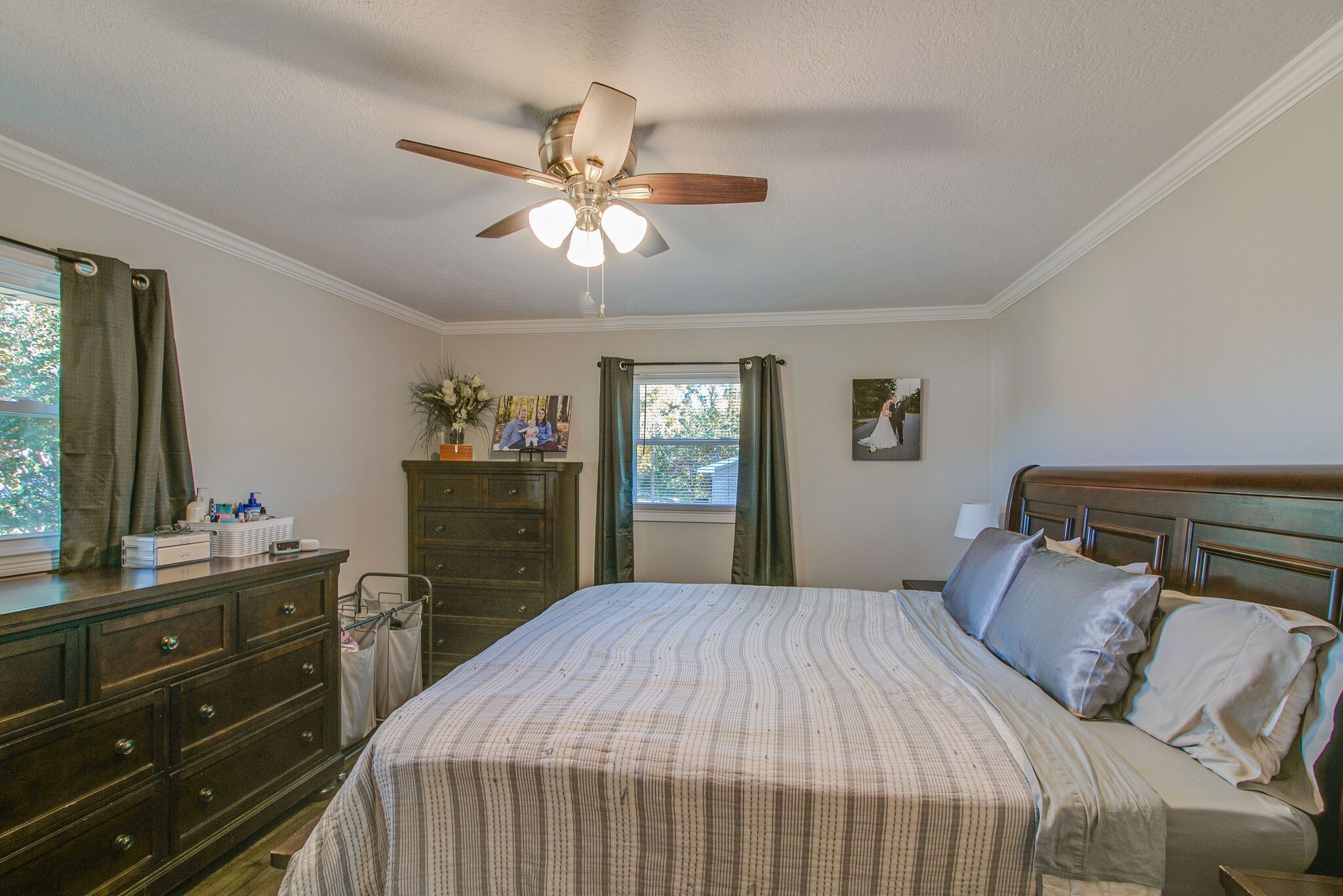 605 Lakeview Court Tennessee Ridge, TN 37178 - Photo 22 of 30 a bedroom with a bed and a dresser