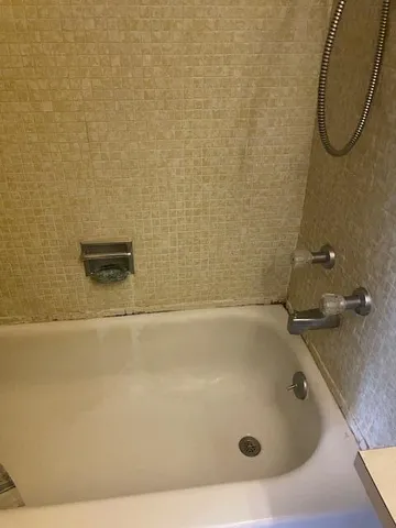 a view of a big room with windows