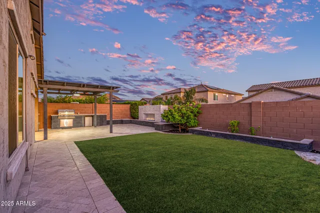 a view of balcony with wooden floor and bench in the background