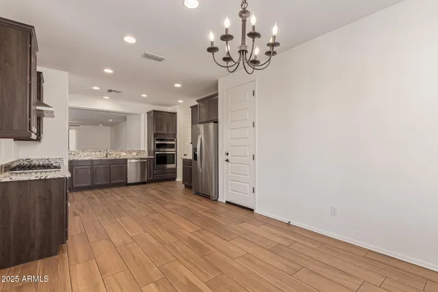 a bathroom with a sink double vanity and a mirror