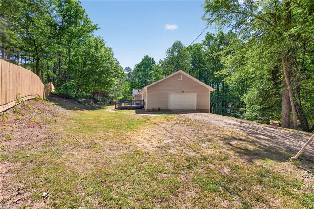 386 Ridgewood Drive Pendergrass, GA 30567 - Photo 43 of 50 a house with a yard