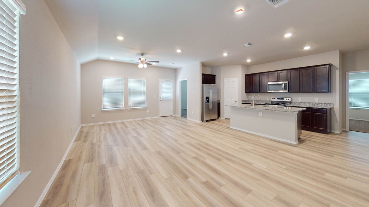 561 Hector Loop Georgetown, TX 78626 - Photo 2 of 30 a view of kitchen with sink and refrigerator