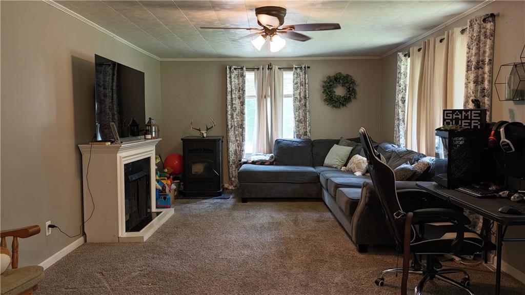 29558 Drake Hill Road Cochranton, PA 16314 - Photo 7 of 18 a living room with furniture and a flat screen tv