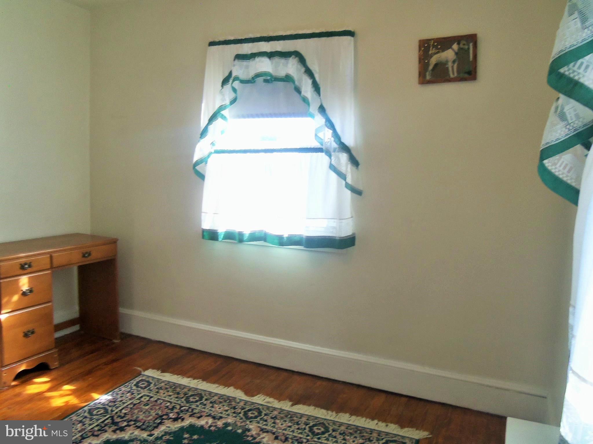 5574 Ashbourne Road Baltimore, MD 21227 - Photo 22 of 29 a room with a washer and dryer