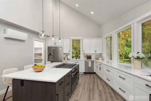 a kitchen with sink cabinets and window