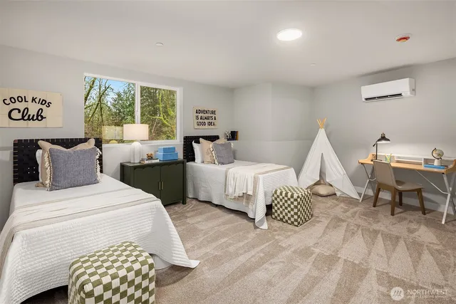 a bedroom with a bed and a couch