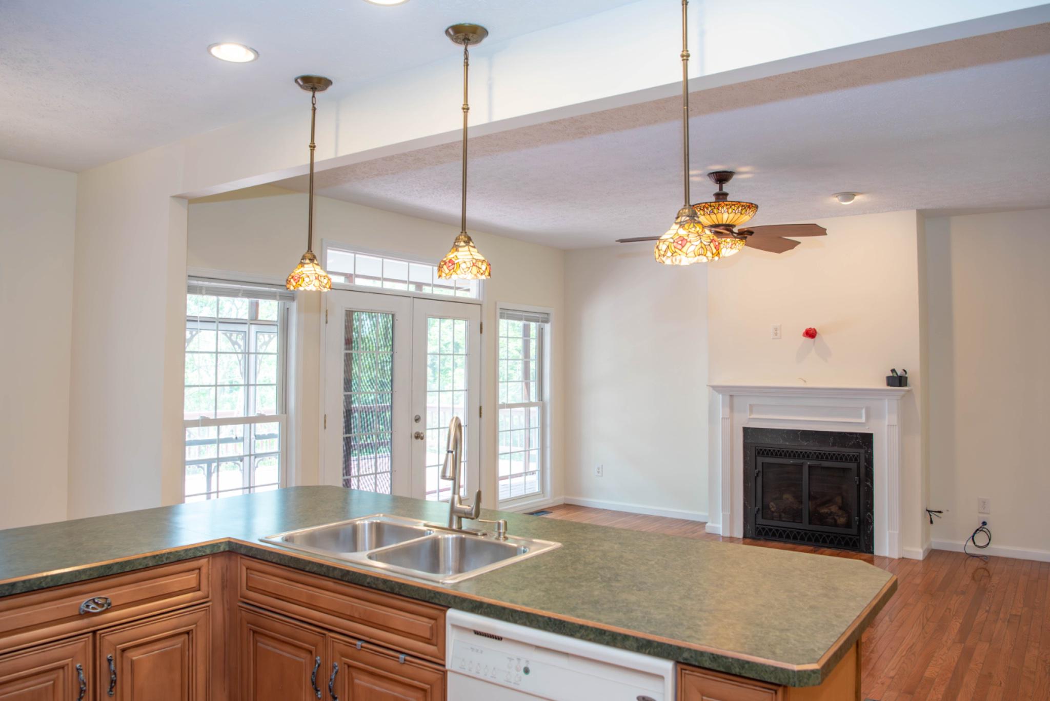 792 Forest Glen Road Moorefield, WV 26836 - Photo 27 of 146 Bright and inviting kitchen/living room space.
