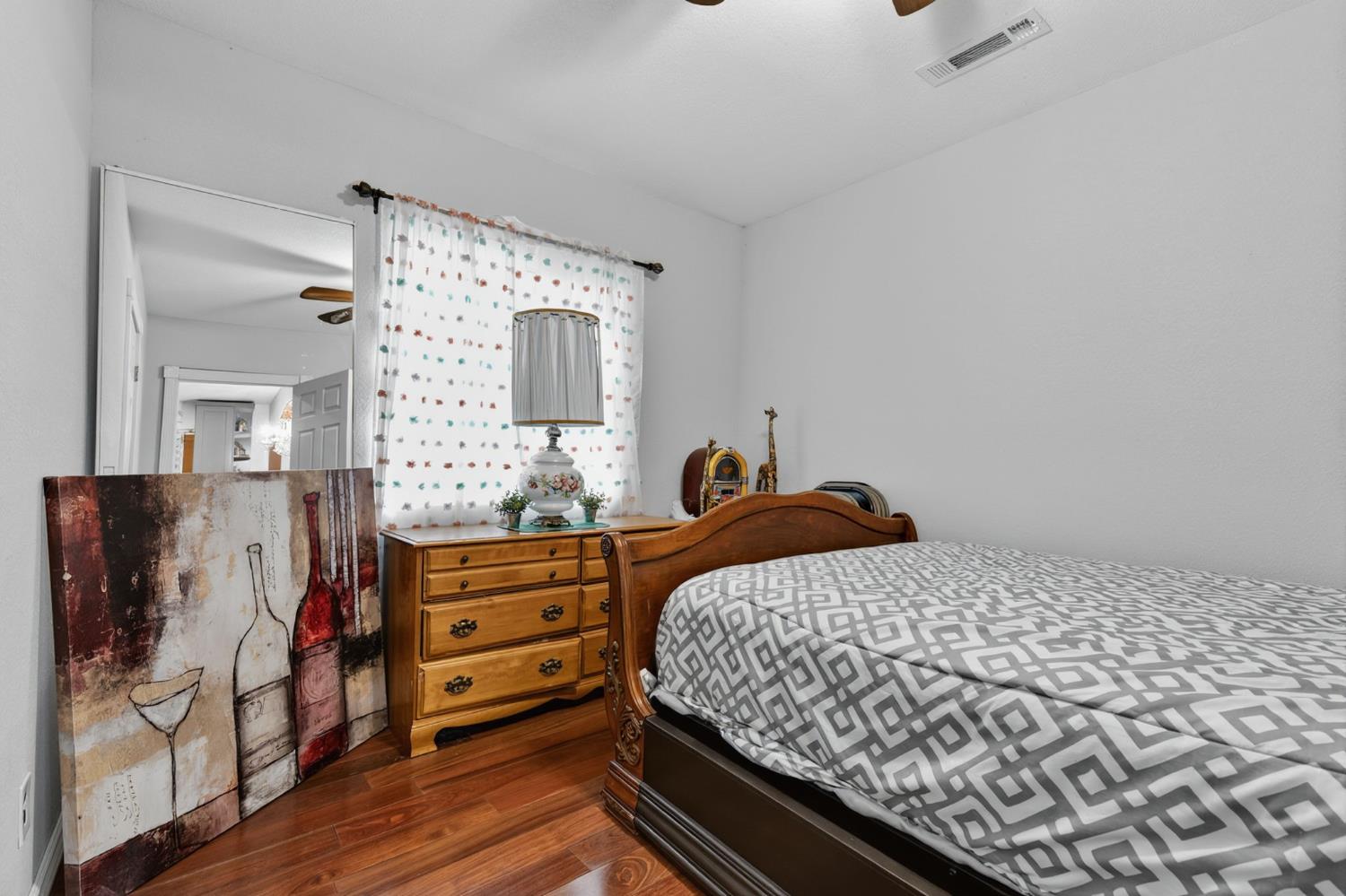5263 Chile Camp Road Campo Seco X, CA 95226 - Photo 12 of 24 a bedroom with a bed and a mirror