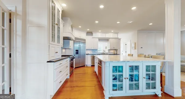 a bathroom with a shower and a sink