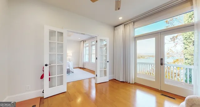 a view of entryway with wooden floor