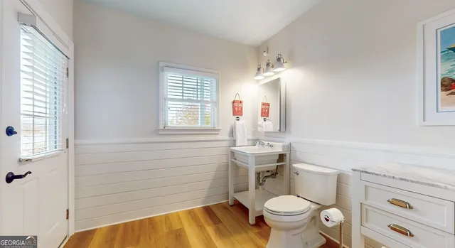 a bed room with furniture and a window