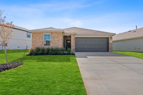 a front view of house with yard