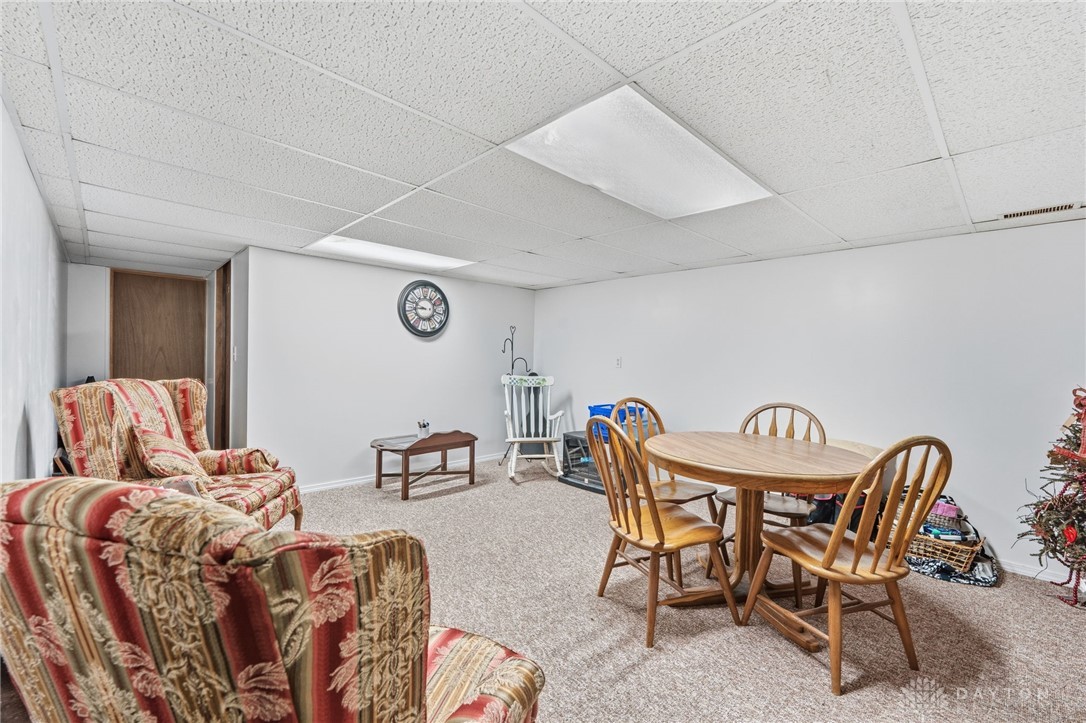 2945 Ashlar Drive Springfield, OH 45503 - Photo 15 of 20 This versatile basement space offers ample room for recreation and relaxation, featuring comfortable carpeting and functional lighting.
