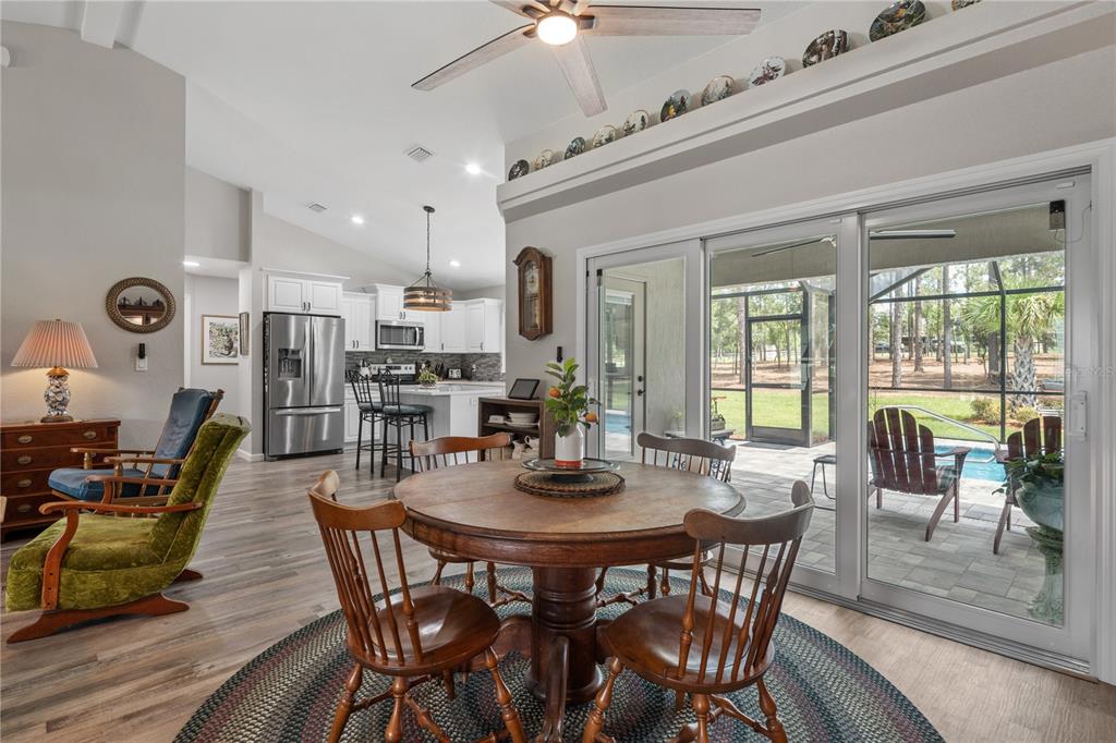 12929 Southwest 89th Street Dunnellon, FL 34432 - Photo 13 of 76 a view of a dining room with furniture window and outside view